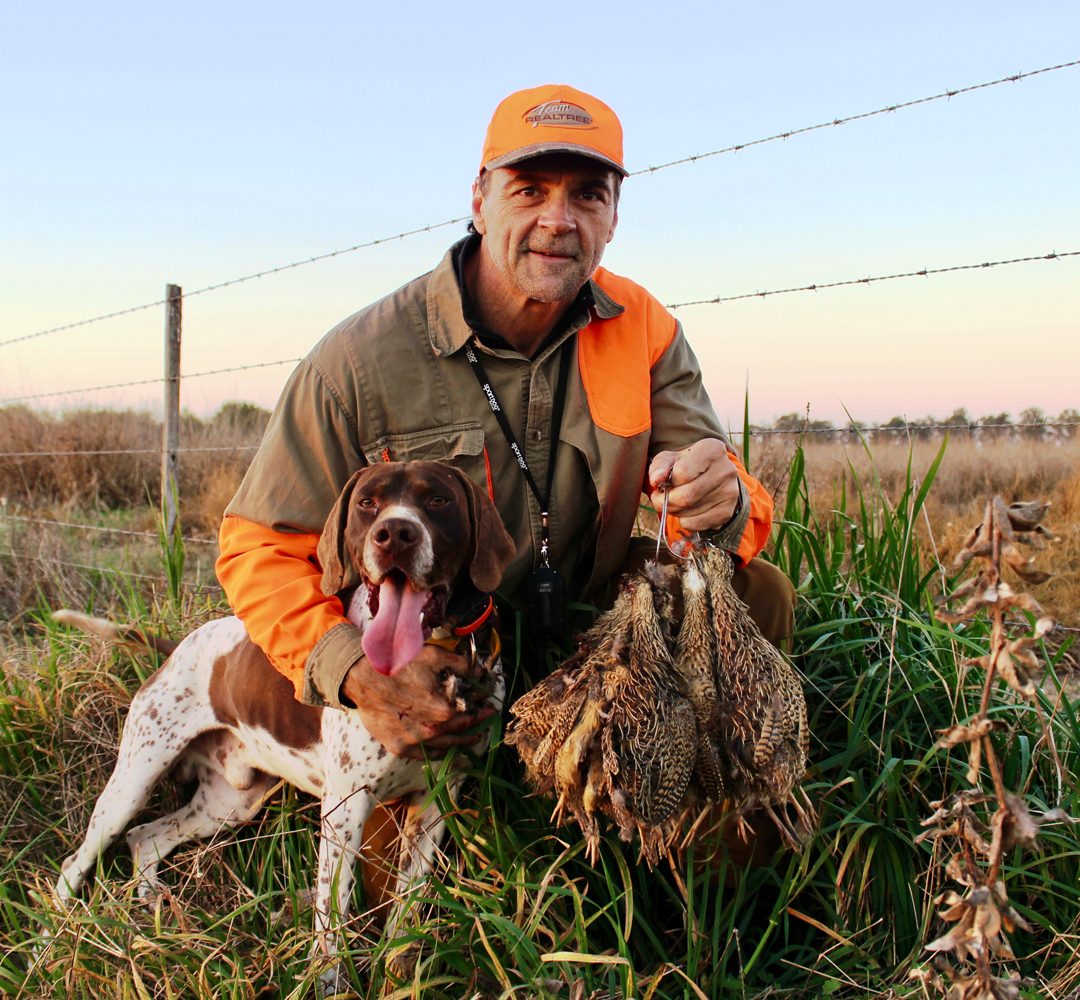 José Luis “JJ” Grasso with his bird dog after an upland hunt