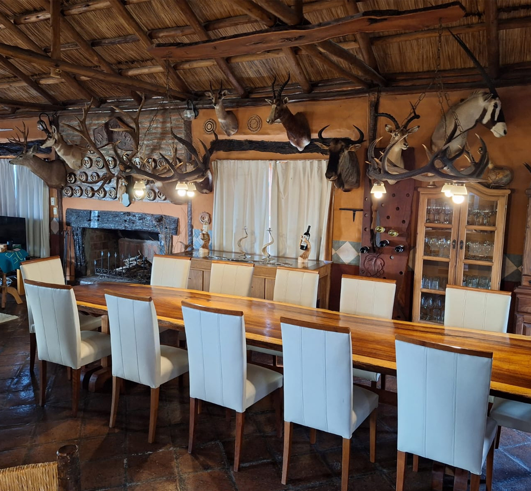 Dining table prepared for guests at a JJ Cacería lodge